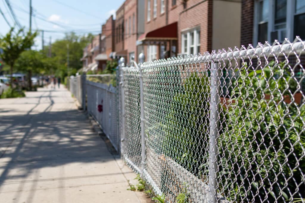 what is the minimum height a chain link security fence can be